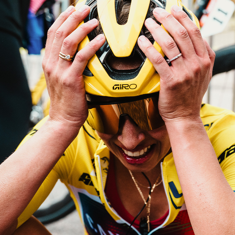 Woman riding with a Giro helmet